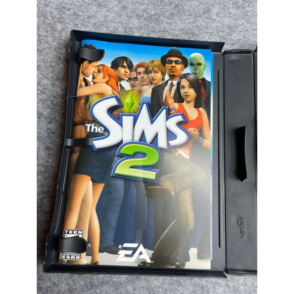 The Sims 2 PC CD-ROM Video Game 4-Disc Set with Manual EA Includes Serial‎ Code